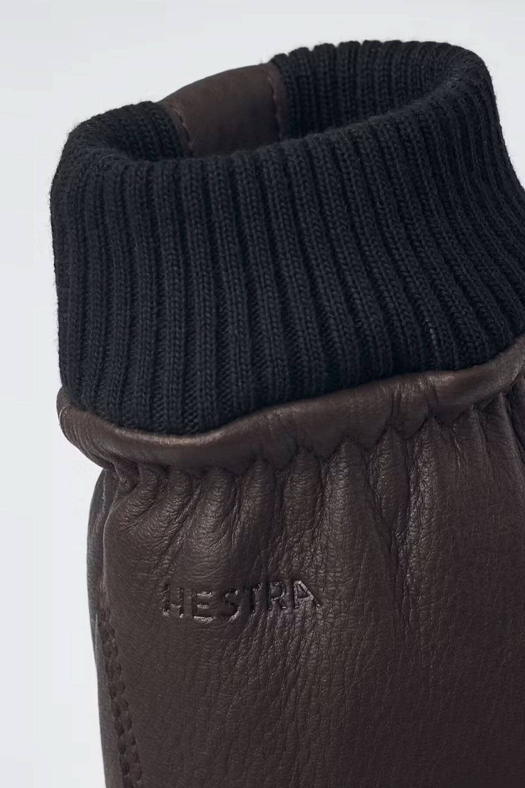 Gant de cuir Tore avec manchette côtelée en tricot pour homme, style sportif et confortable.