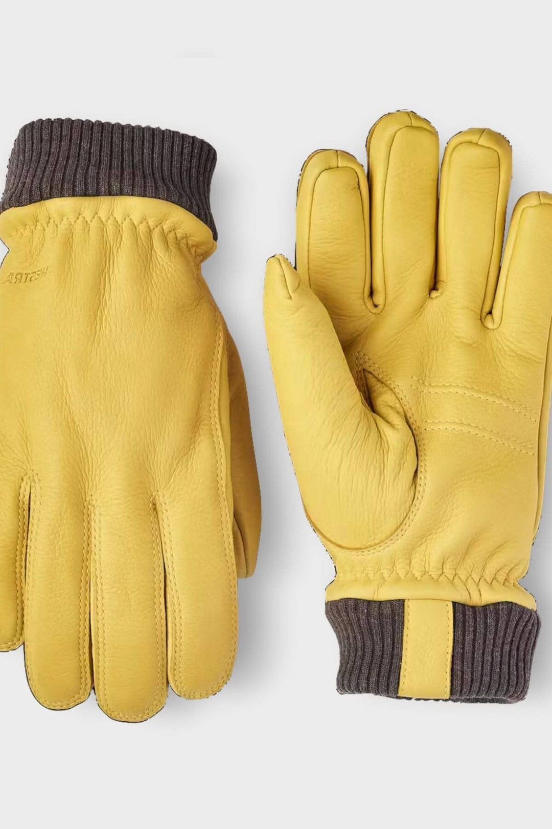 Gant de cuir jaune pour homme, isolé, pré-courbé, avec manchette côtelée pour confort en hiver.