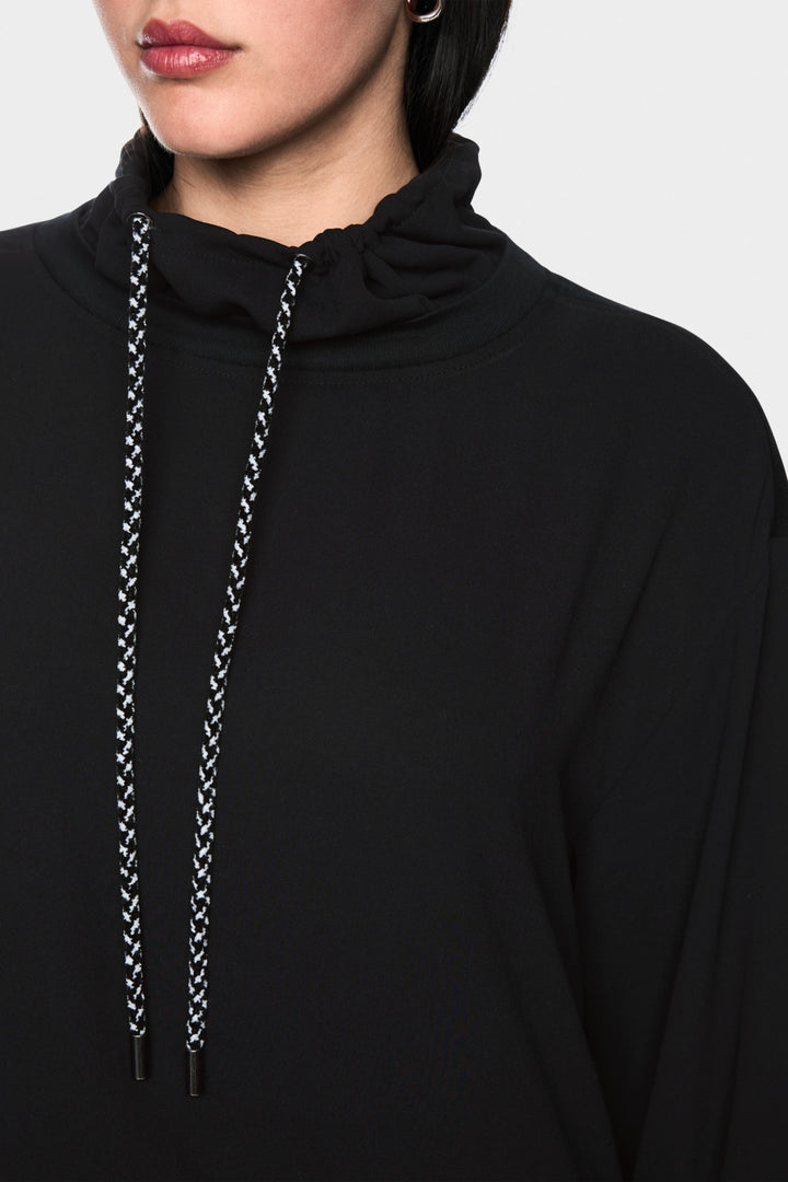 Loose blouse with drawstring neckline 