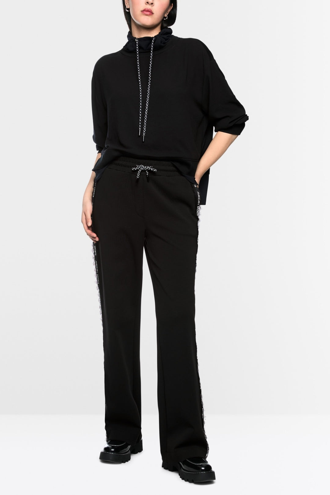 Loose blouse with drawstring neckline 