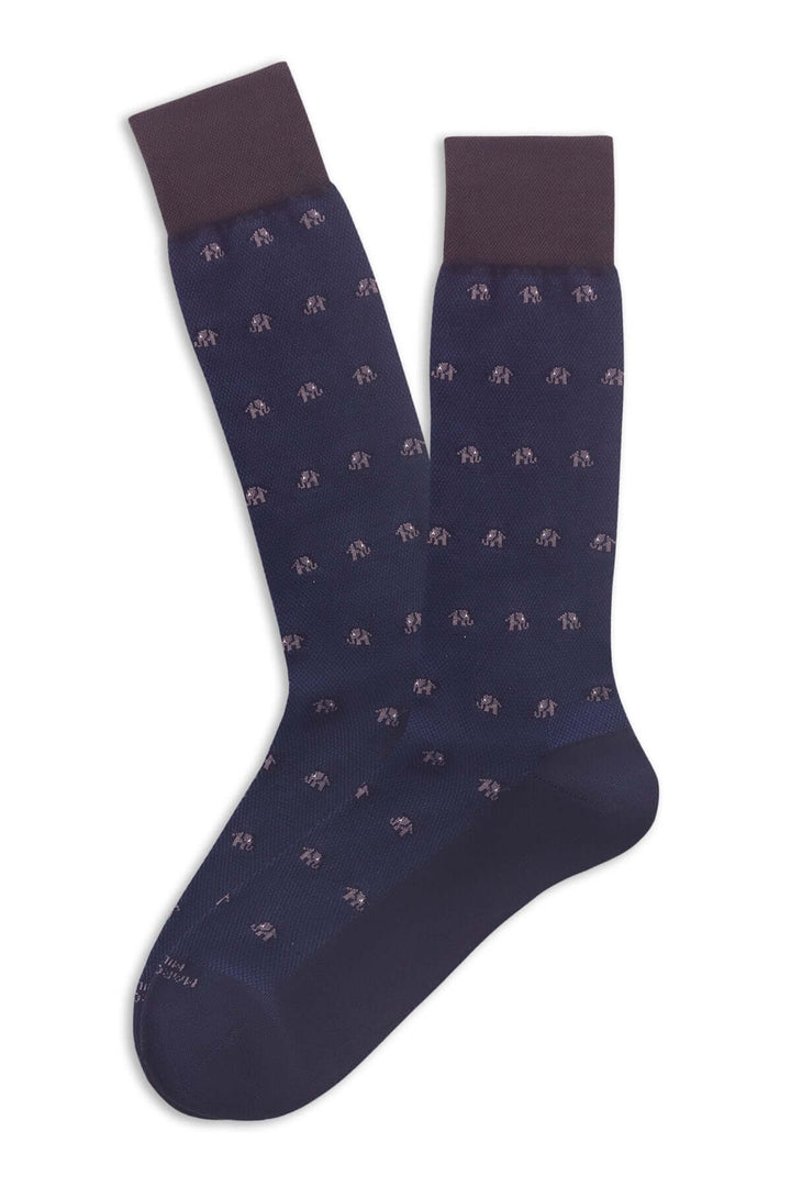 Bas fantaisie bleu marine avec motif d'éléphants brodés, style élégant et ludique.