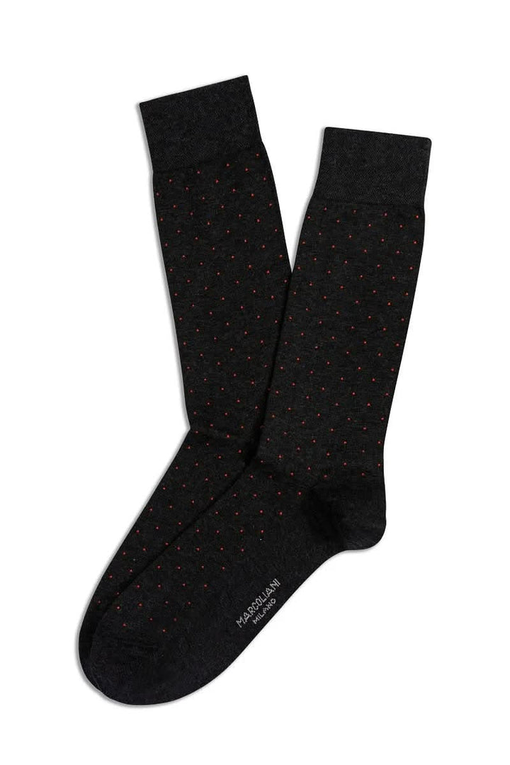 Bas à pois noirs élégants, confortables et extensibles pour un look professionnel ou décontracté.