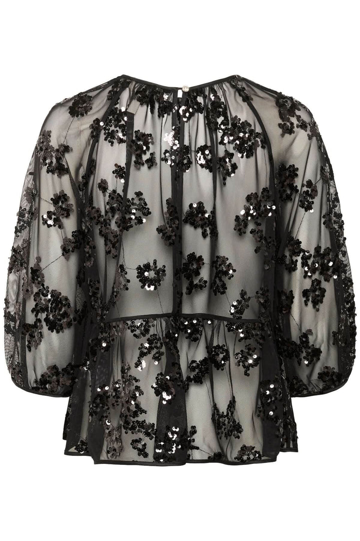 Blouse Vivan à sequins floraux avec fleurs brodées sur tulle transparent, élégante pour une soirée.