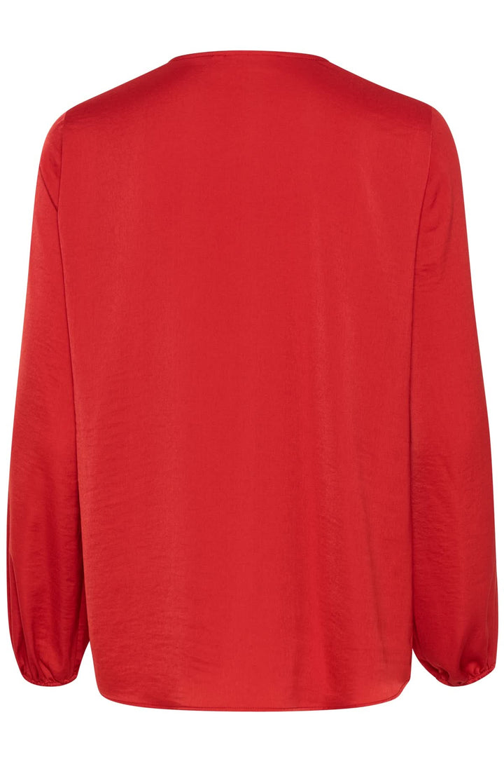 Blouse col en V Rinda vue arrière, coupe ample rouge, manches longues élégantes.