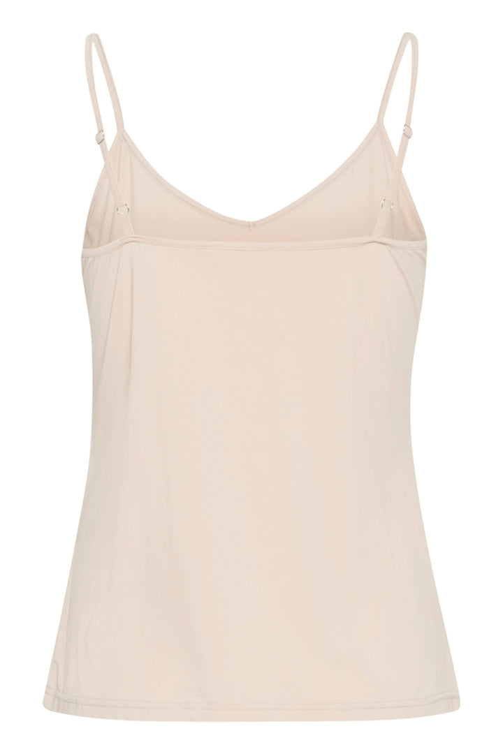 Camisole Lissandra encolure en V délicate, coupe ajustée, bretelles fines, couleur crème, confortable et polyvalente pour toute occasion.