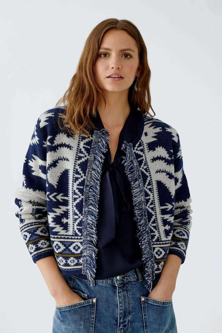 Cardigan motif western en jacquard avec franges, coupe étroite, col rond et manches longues.