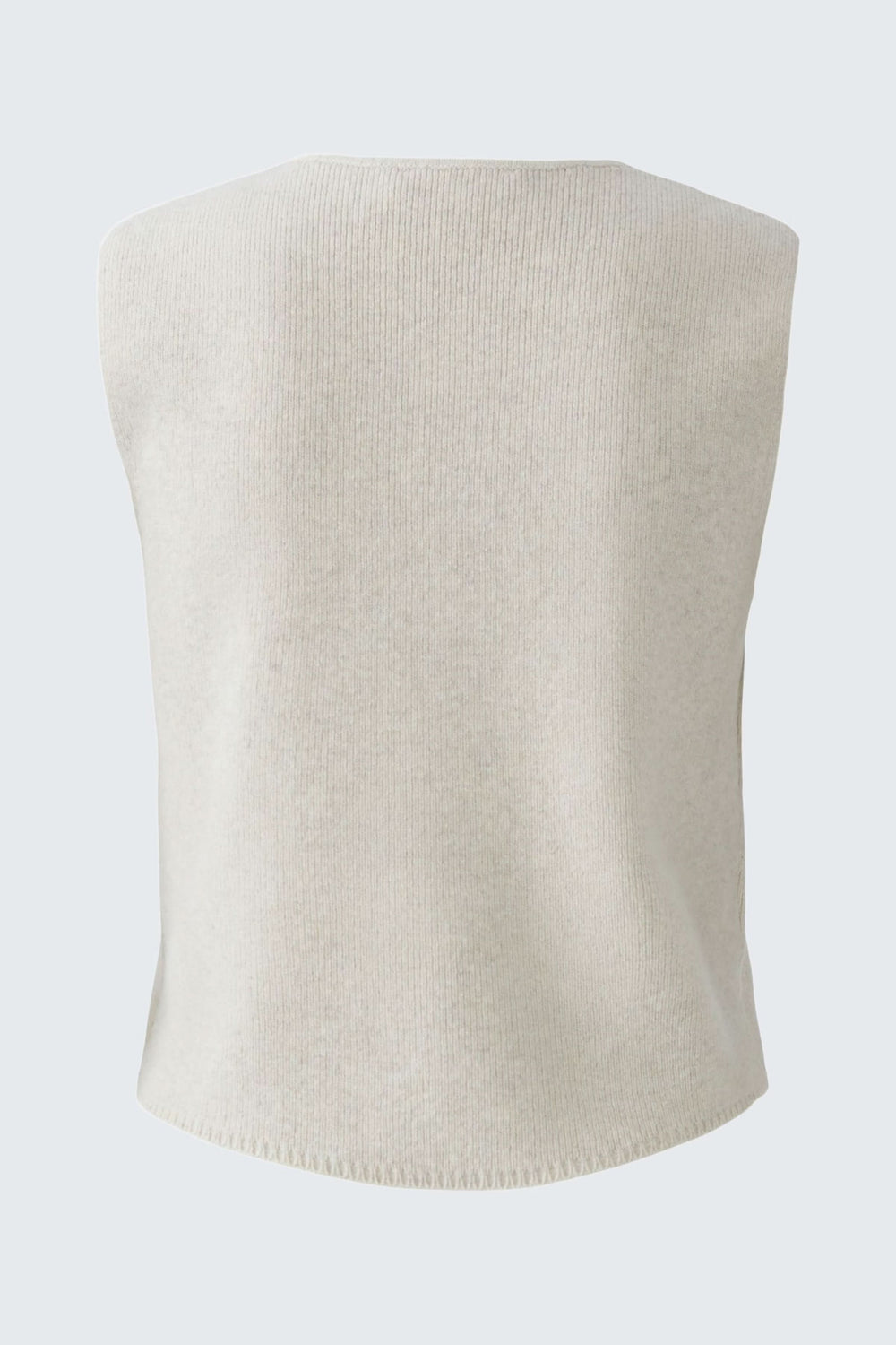 Cardigan sans manches en maille douce, couleur crème, vue arrière, design minimaliste et moderne.