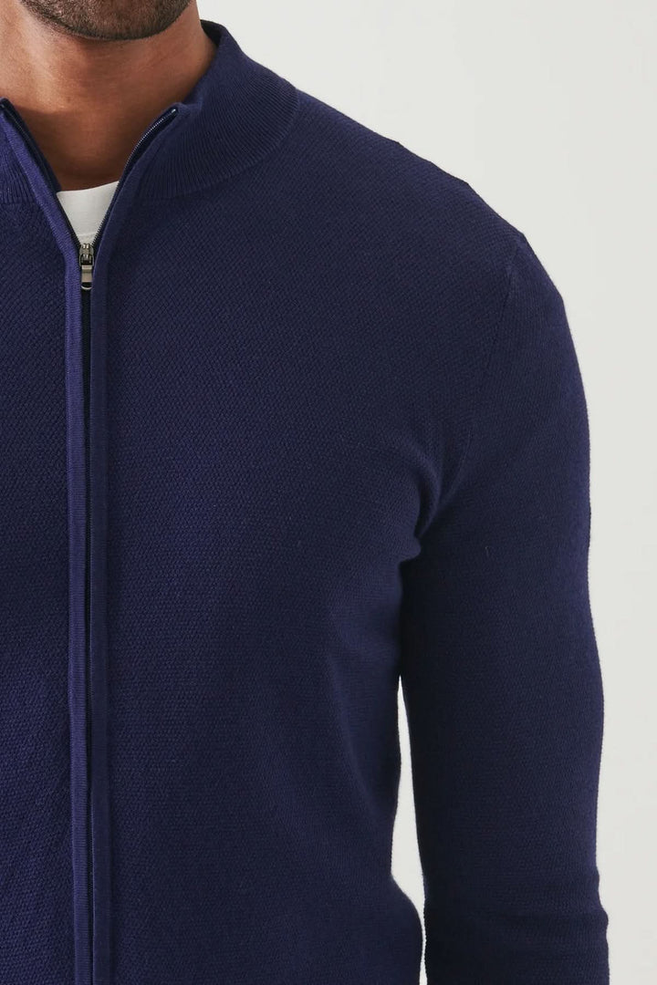 Cardigan zippé en coton et cachemire, élégant et doux, en maille piquée, idéal pour un look décontracté.