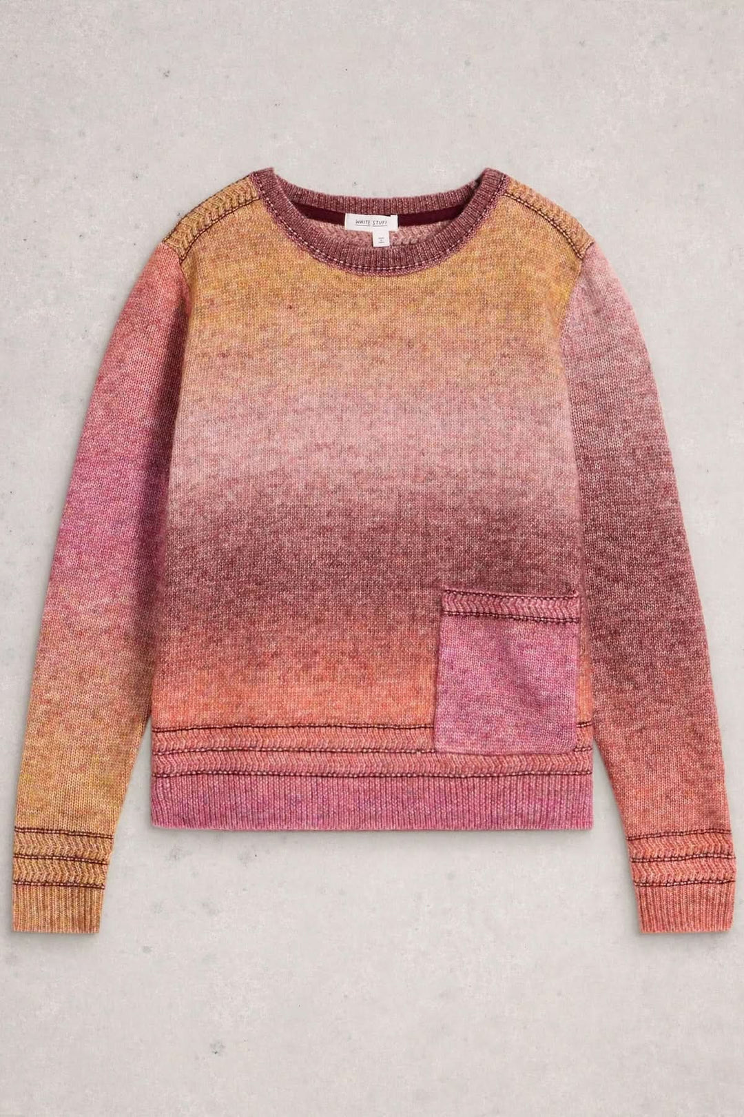 Chandail Lilbet en maille dégradée avec poche kangourou et couleurs chaudes, coupe ample et confortable.