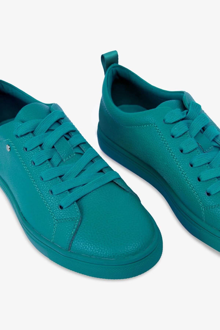 Chaussures simples à lacets pour femme, couleur turquoise, design épuré et écoresponsable.
