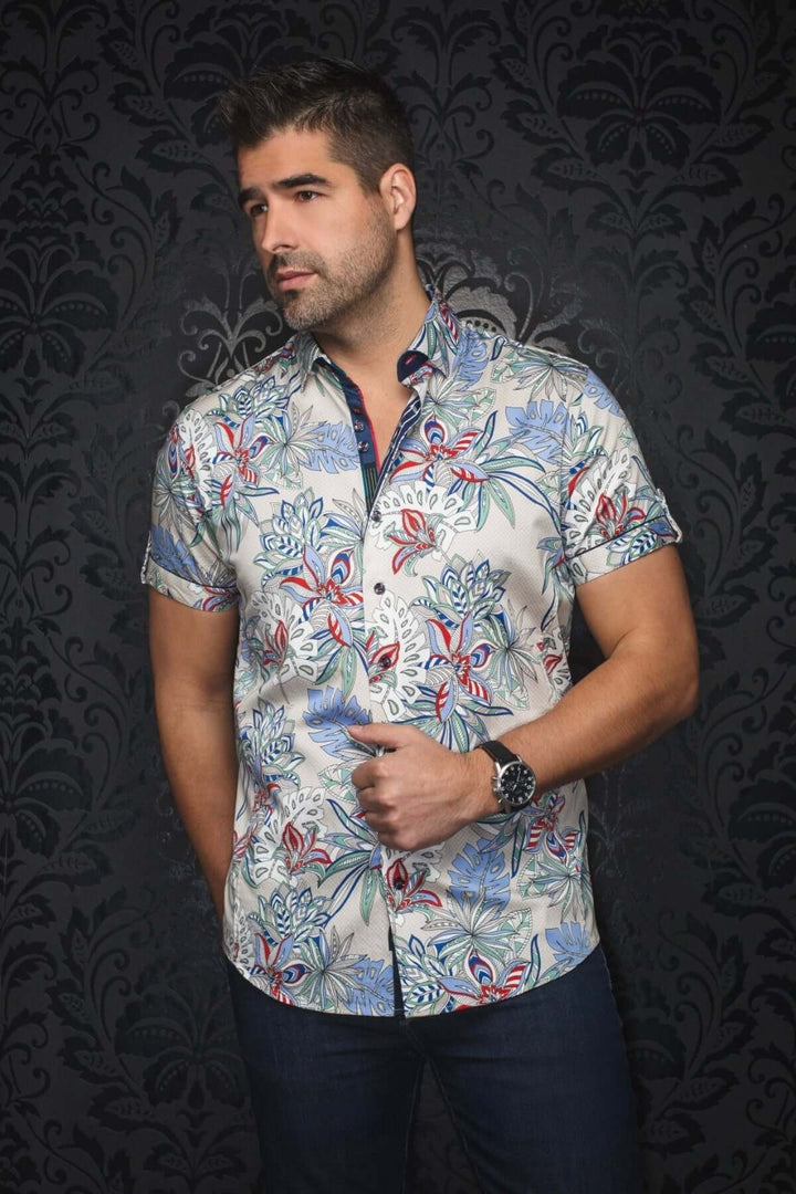 Chemise à manches courtes au motif tropical, élégante avec un col classique et une coupe structurée.
