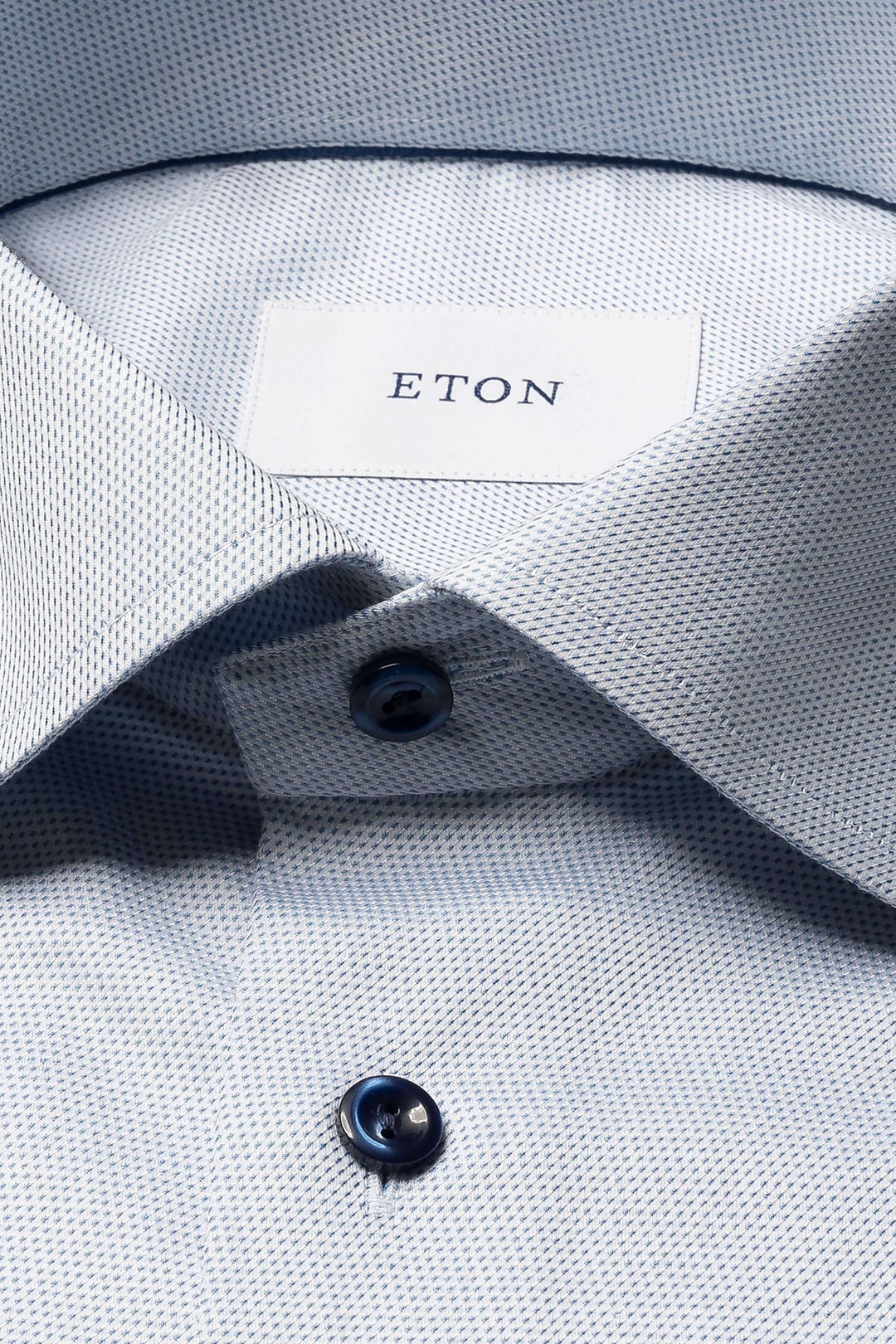 Chemise ETON en tissu fin, col ouvert, boutons élégants, motif discret, style sophistiqué pour occasions formelles.