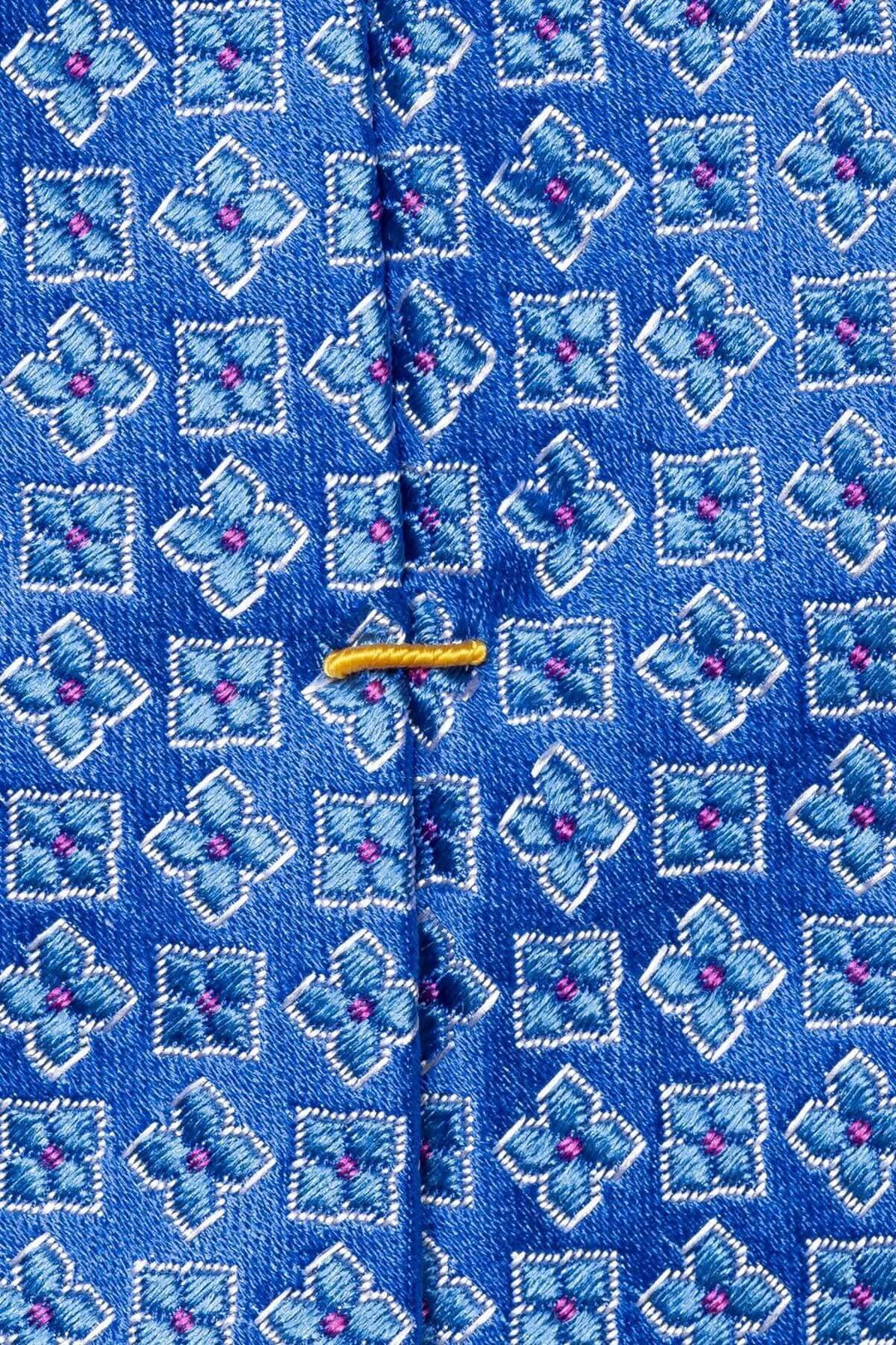 Cravate en soie bleue avec motif géométrique sophistiqué et détails brodés, idéal pour les occasions formelles.