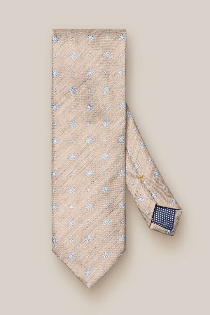 Cravate en soie et lin à motifs floraux, élégante et contemporaine, fabriquée en Italie, couleur beige.