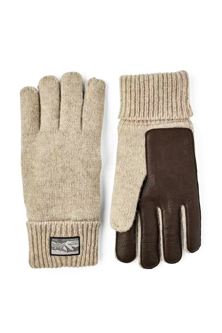 Gants en maille confortables et souples avec poignets côtelés, conçus pour garder les mains au chaud. Décris moi le produit en français.