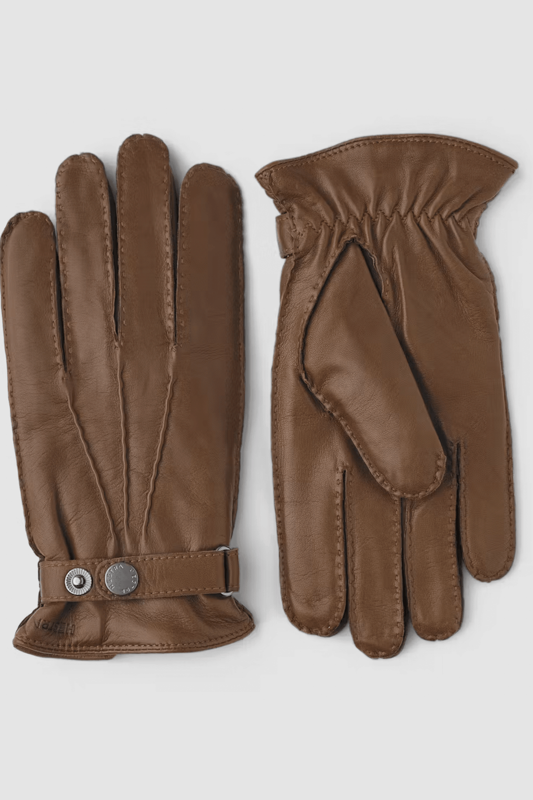 Gants de cuir marron en nappa d'agneau italien, doublés en laine tricotée et finition élégante avec bouton-pression.