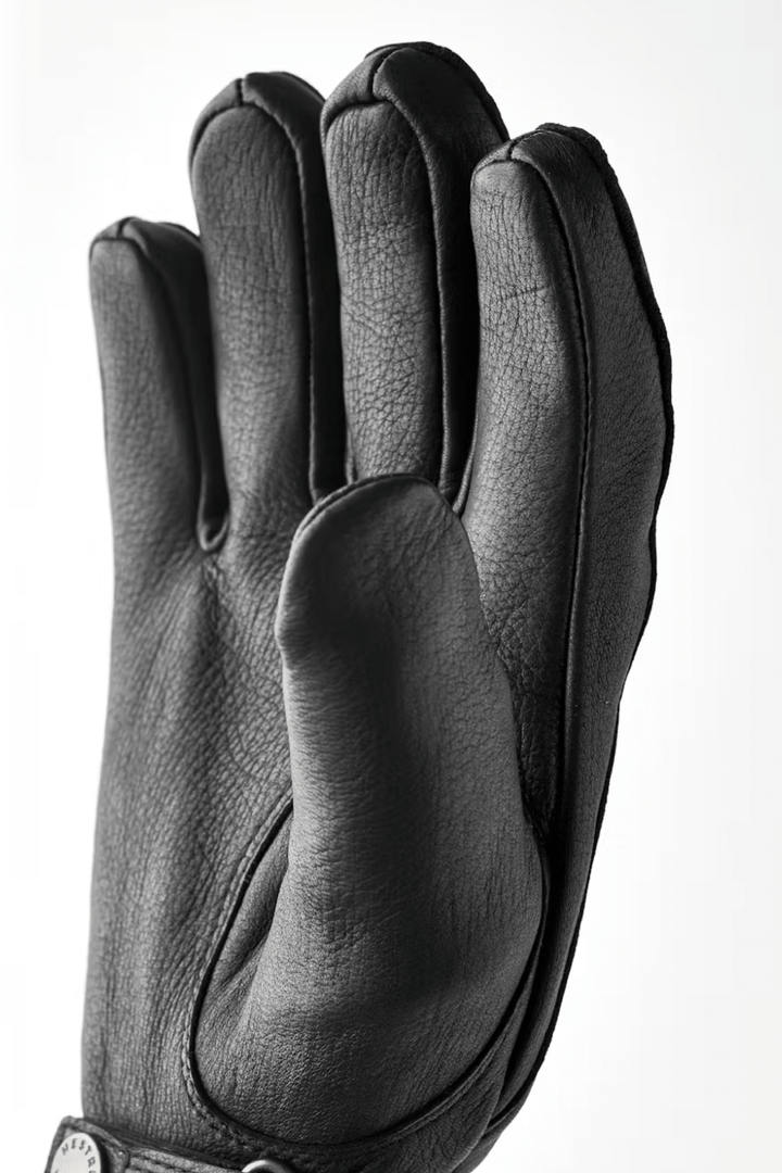 Gants en cuir Burensvik pour homme, offrant chaleur et confort lors des journées froides.