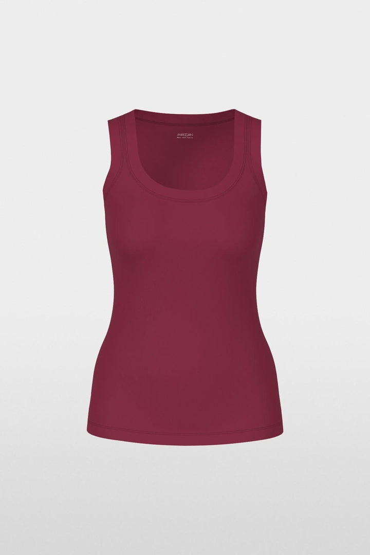 Haut sans manches en coton côtelé bordeaux avec coupe ajustée et finitions contrastées pour un look minimaliste et confortable.