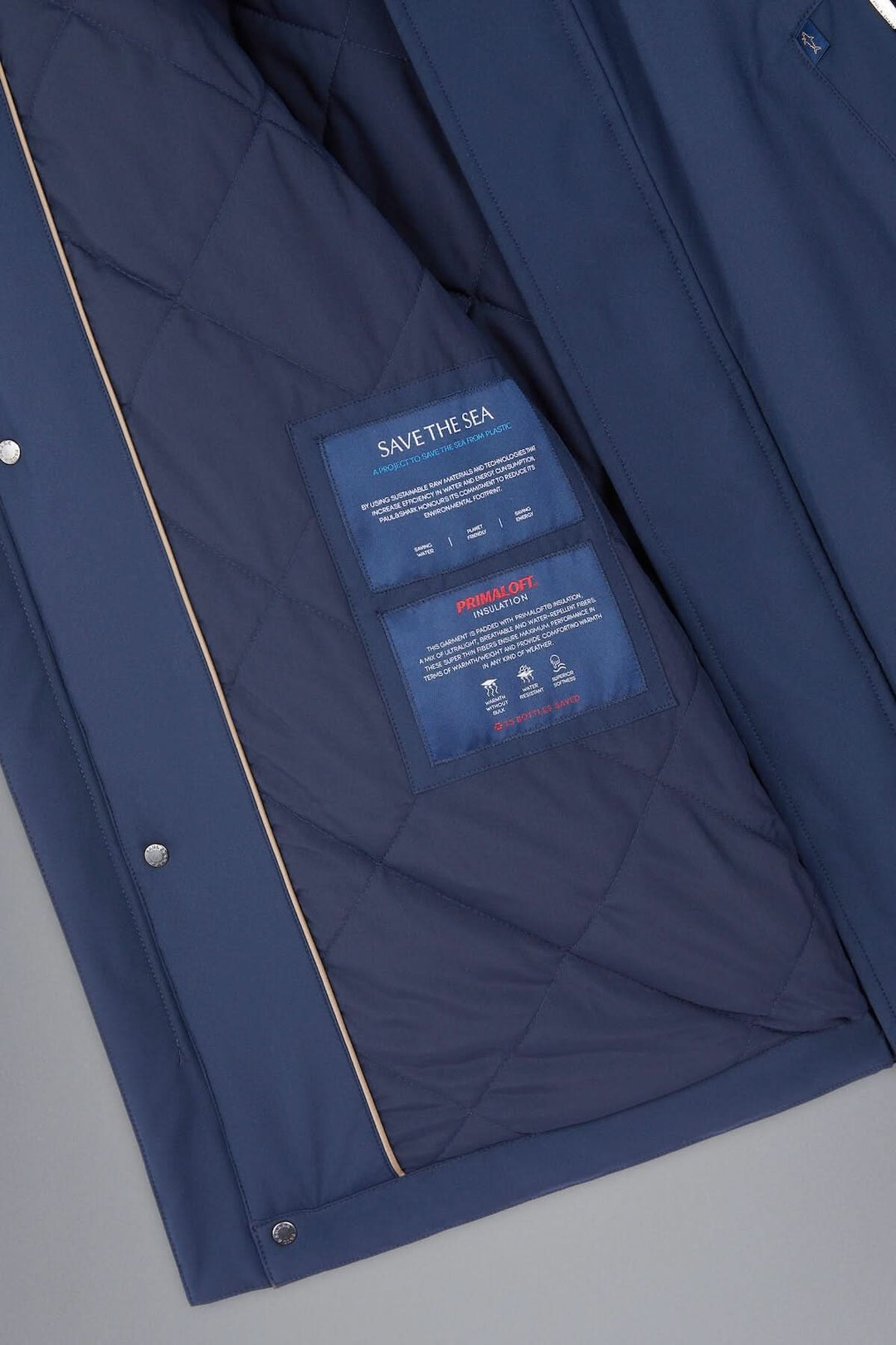 Doublure intérieure du manteau d'hiver Primaloft bleu marine avec étiquette Save the Sea.
