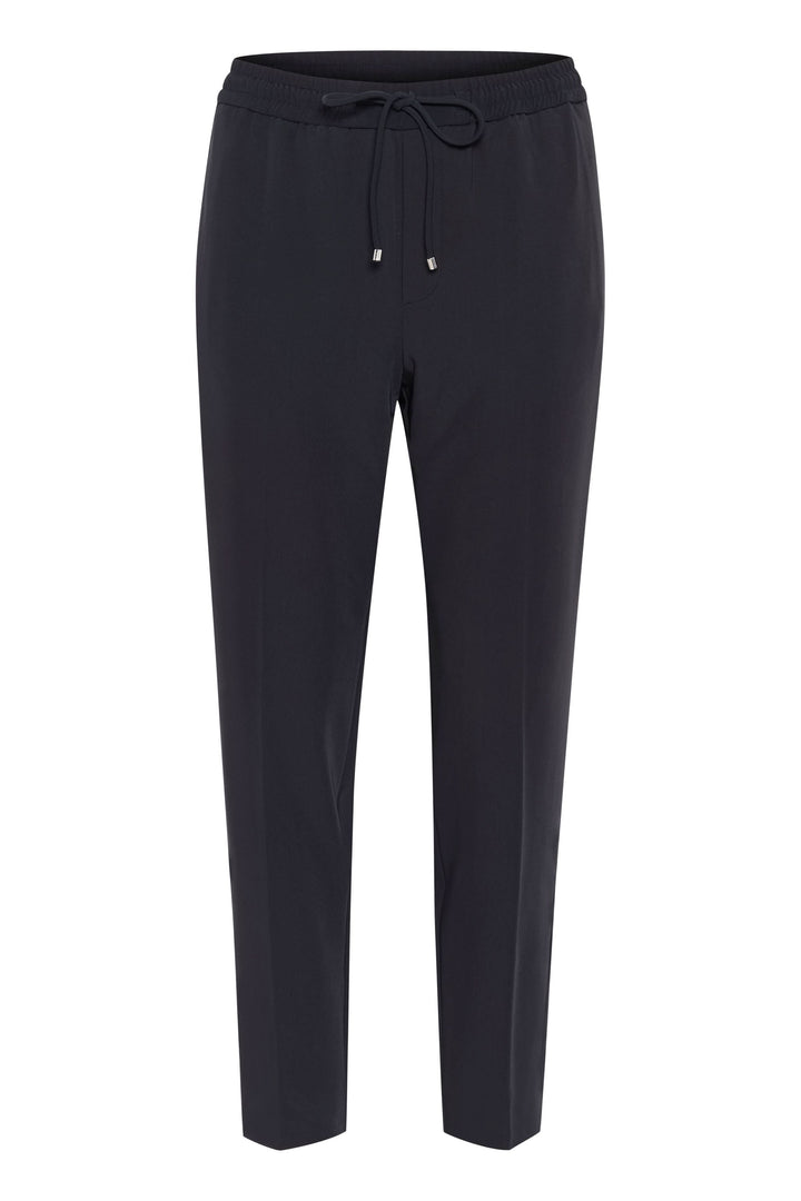 Pantalon Adian noir, coupe décontractée, taille élastique et cordon, poches avant, style chic et confortable.