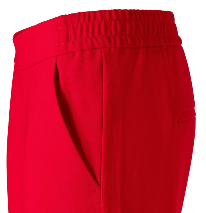 Pantalon Chiara cropped rouge avec taille élastique et poches pour un look chic et décontracté.