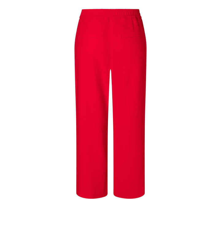 Pantalon Chiara Cropped rouge, coupe large, taille élastique, style chic et décontracté.