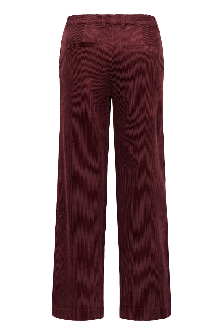 Pantalon en velours côtelé bordeaux, coupe large et fluide, vue arrière, taille haute, style rétro-chic.