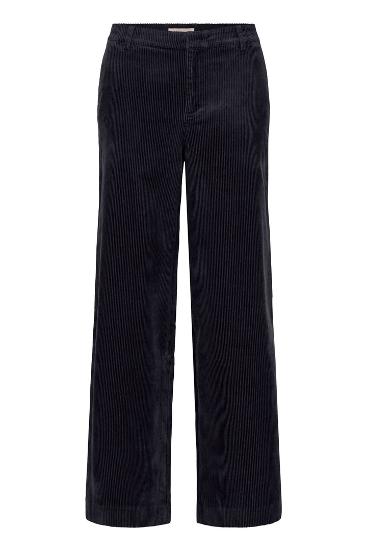 Pantalon Clarissi en velours côtelé, large et fluide, taille haute pour un look rétro-chic et moderne.