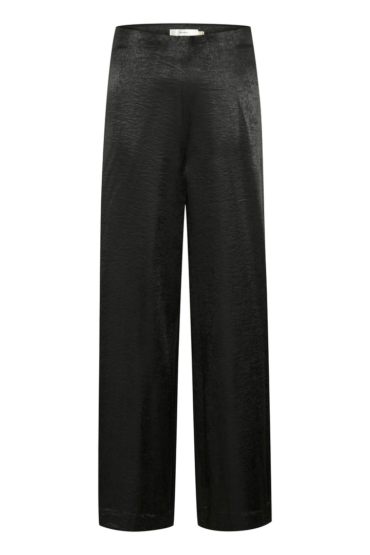 Pantalon Didra en tissu satiné noir, coupe droite, taille haute et design chic et minimaliste.