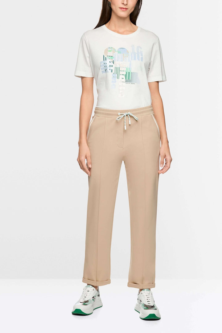 Pantalon FRIA à enfiler en mélange de coton avec taille élastique et cordon, coupe droite légèrement fuselée, style casual chic.