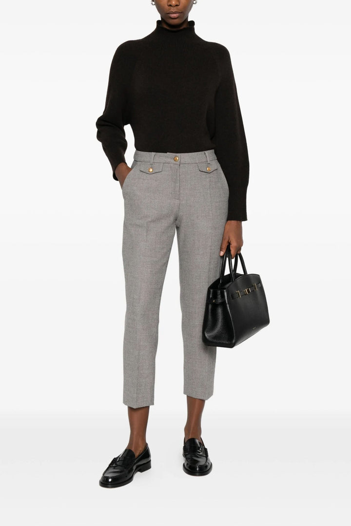 Pantalon Krystal habillé à taille mi-haute, élégance moderne, poches à rabat, coupe ajustée, idéal pour bureau ou occasions formelles.