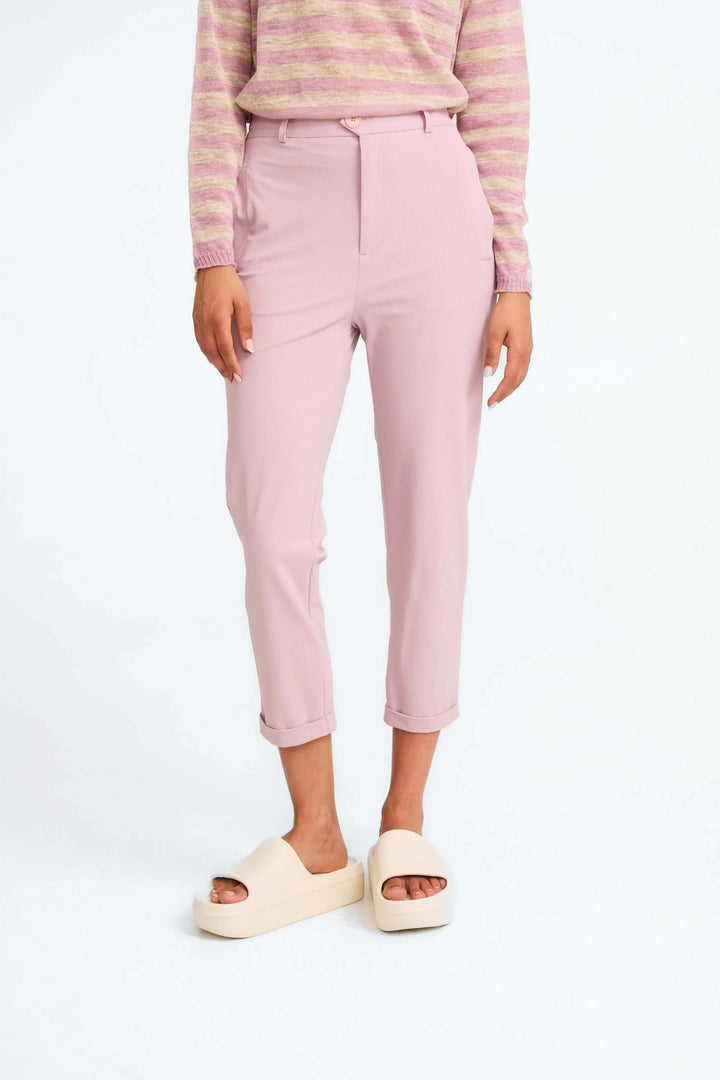 Pantalon 7/8e rose à taille haute, élégant et confortable, idéal pour un look moderne et décontracté.