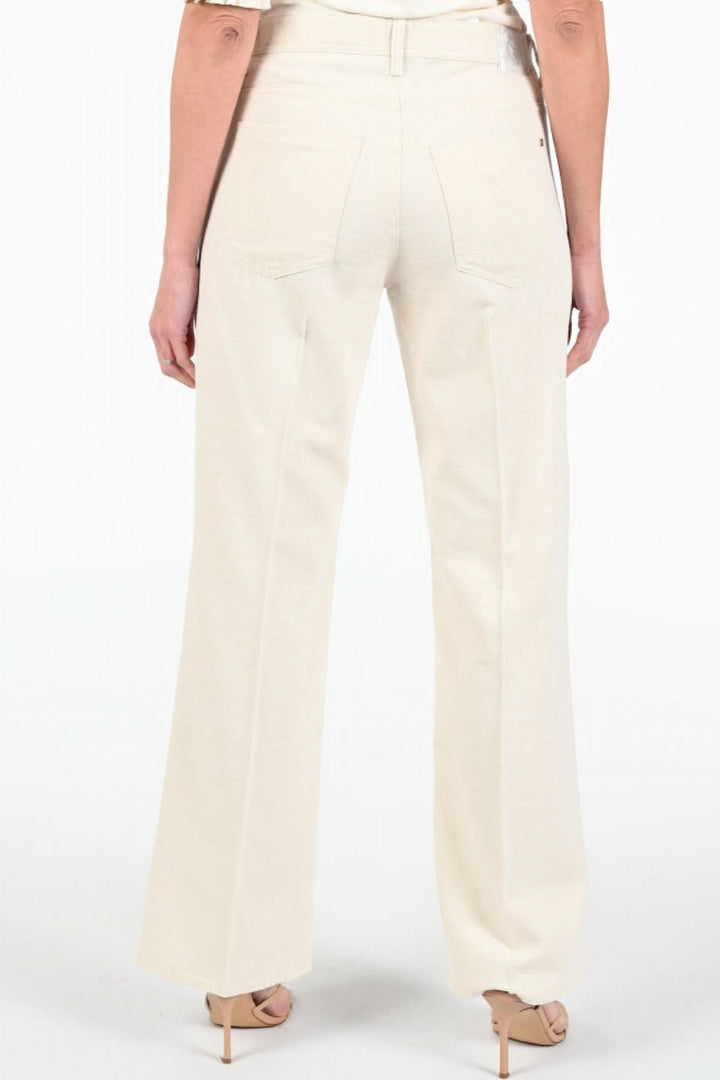 Pantalon MAINE lurex doré naturel, vue arrière de la coupe évasée et poches élégantes.