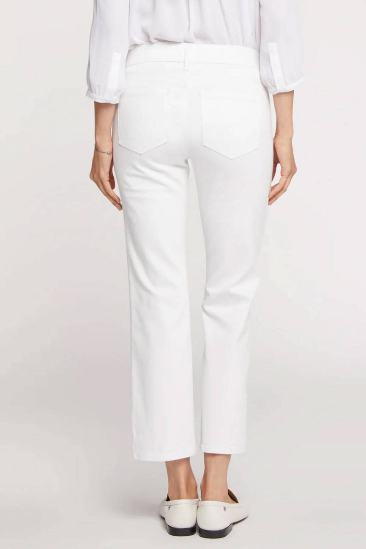 Vue arrière du pantalon Marilyn blanc, coupe classique avec poches et longueur cheville.