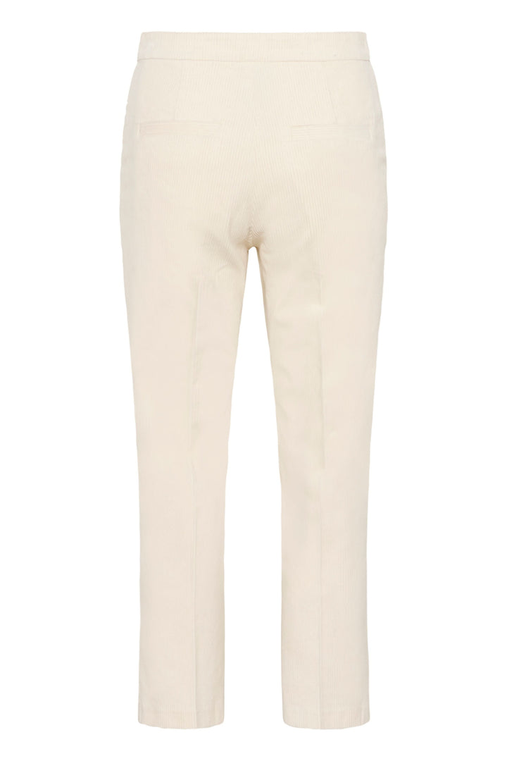 Pantalon Mishas en velours côtelé blanc cassé, coupe droite et taille mi-haute, idéal pour un style casual chic et confortable.