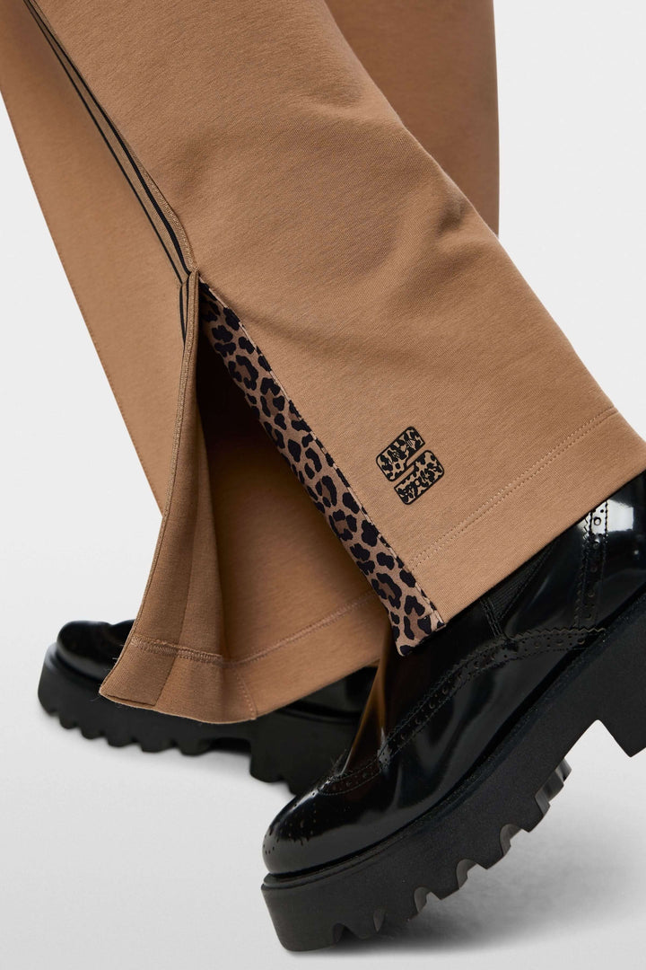 Pantalon décontracté à bandes contrastantes avec détail léopard sur l&