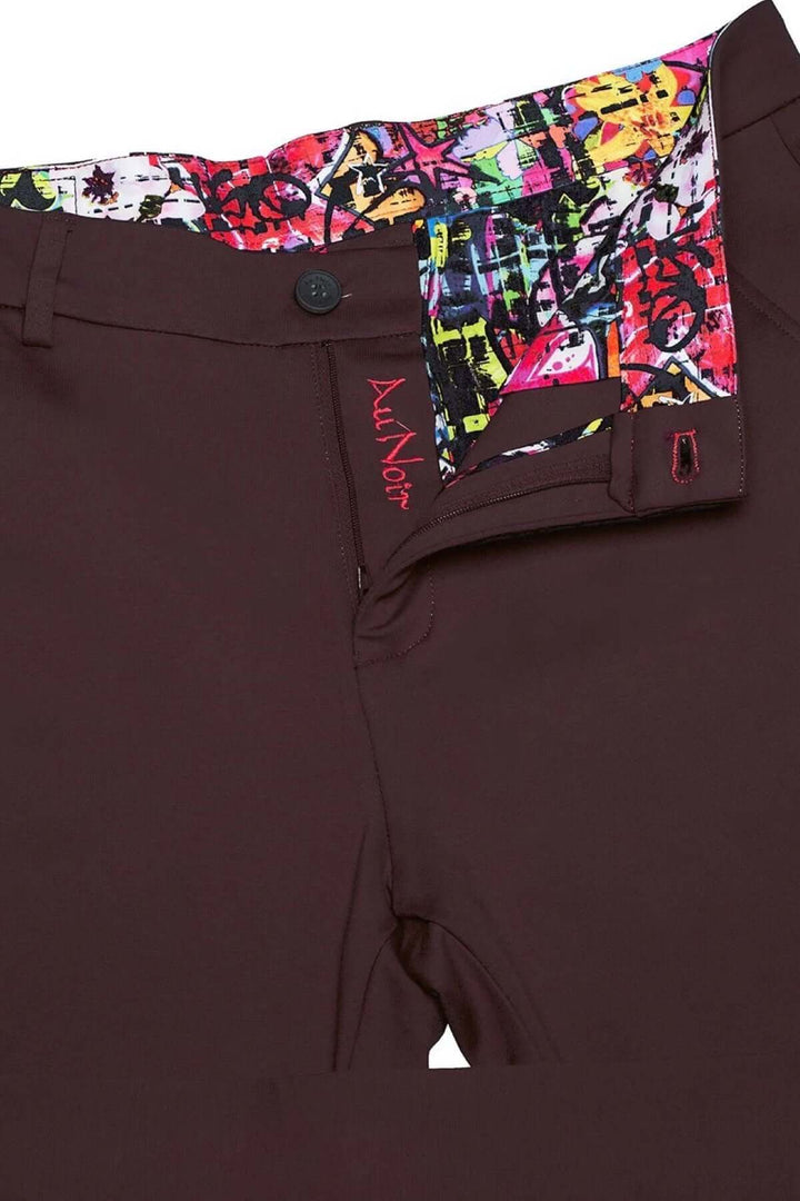 Pantalon Beretta en tissu extensible, coupe ajustée avec finitions colorées et poches arrière élégantes.