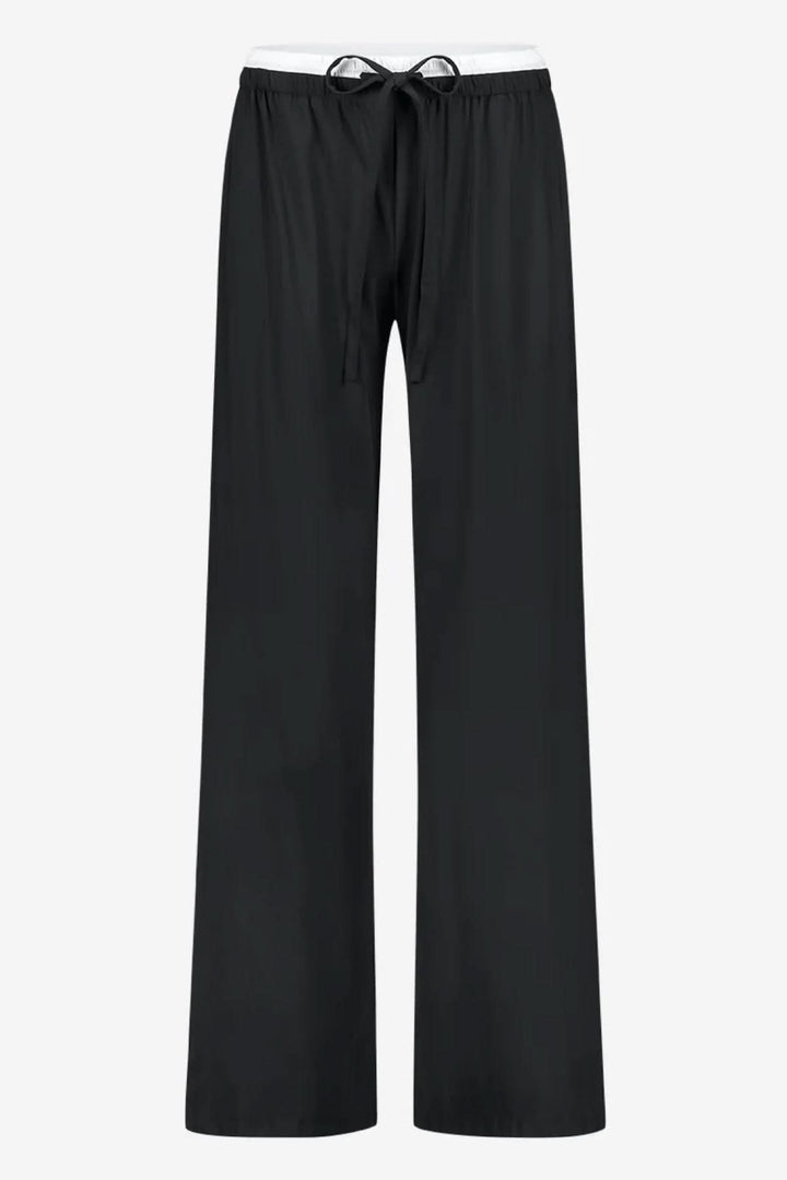 Pantalon en jersey Antiny, ample et fluide, taille élastique, idéal pour des looks décontractés et raffinés.