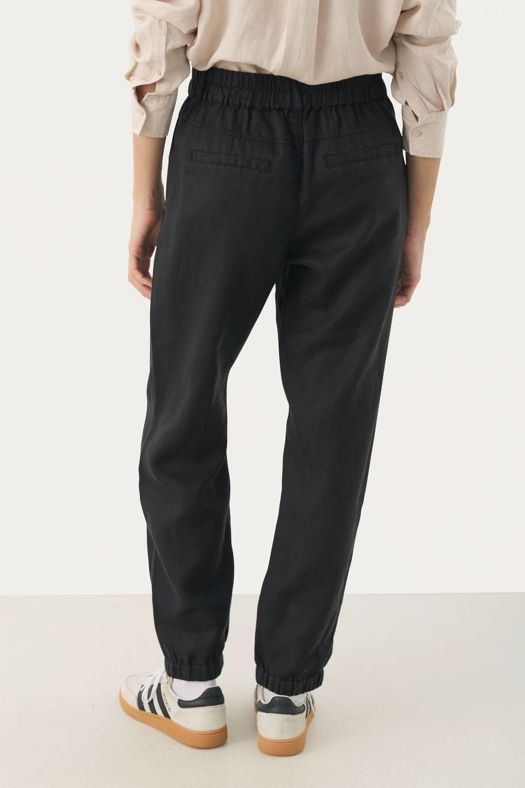 Pantalon en lin Shenas avec taille élastique et chevilles à élastique, style décontracté et ample.
