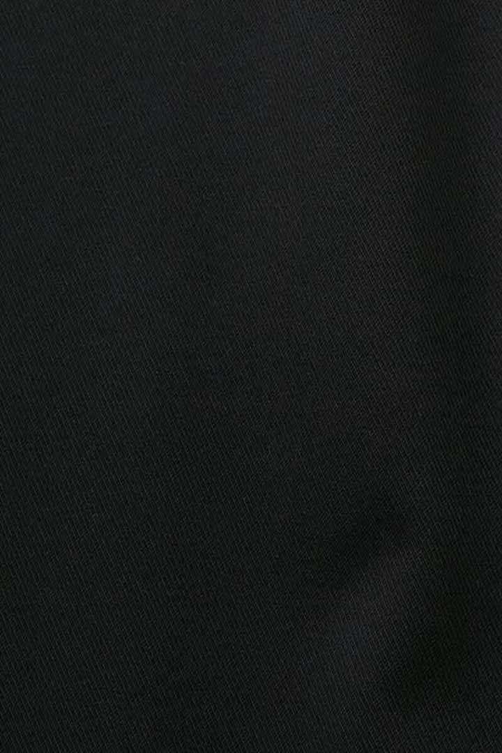 Tissu noir lisse pour pantalon habillé, idéal pour le bureau et les événements formels.