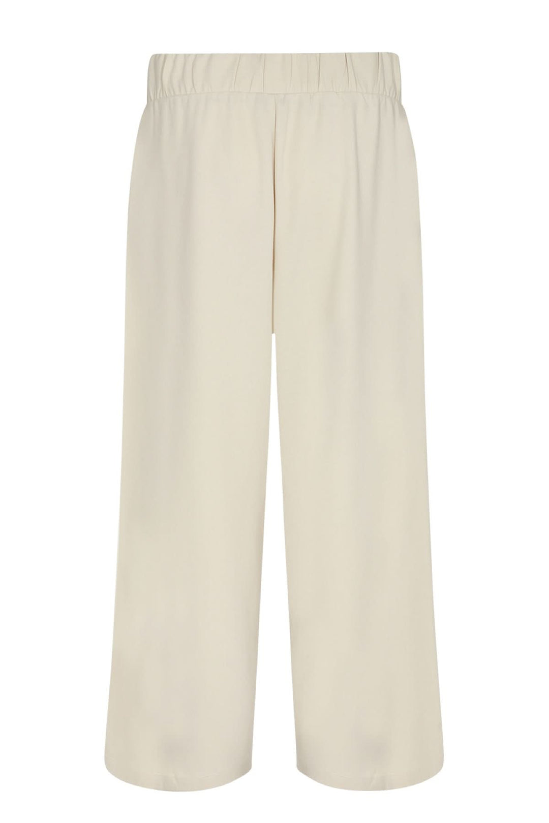 Pantalon jambe large en polyester recyclé et élasthanne, coupe décontractée, couleur crème, avec taille élastique.