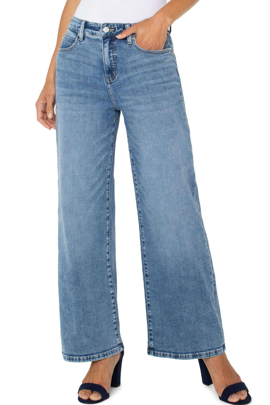 Pantalon large taille haute Stride en denim délavé, coupe moderne et décontractée, adapté à toutes occasions.