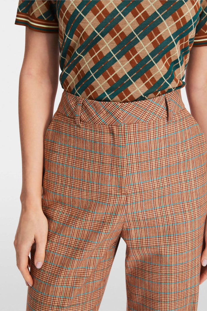 Pantalon à motifs carreaux, jambe large et extra-longue, idéal pour les tenues professionnelles.