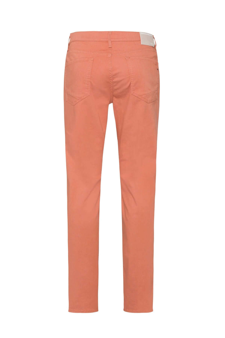 Pantalon à taille élastique, coupe droite, couleur corail, vu de dos, avec poches et cordon ajustable.