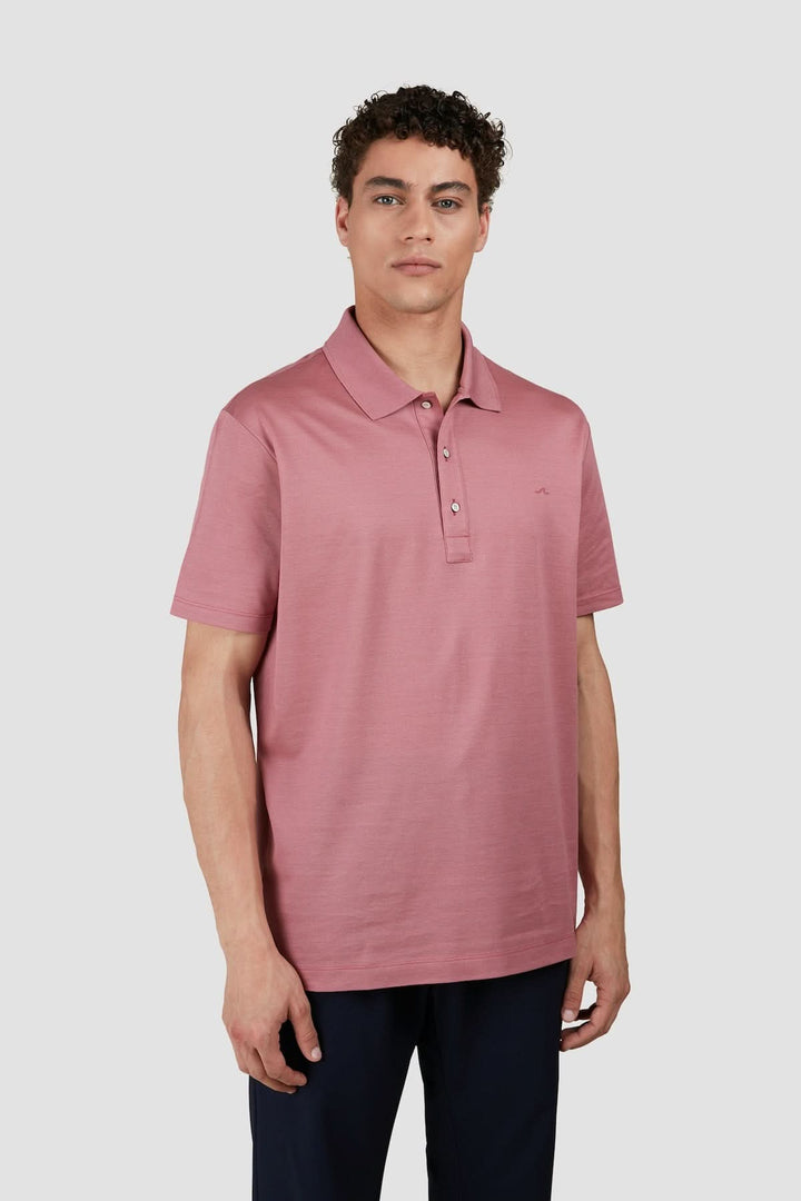 Polo de coton rose de la collection Silver, avec col structuré et logo discret, pour un style intemporel.