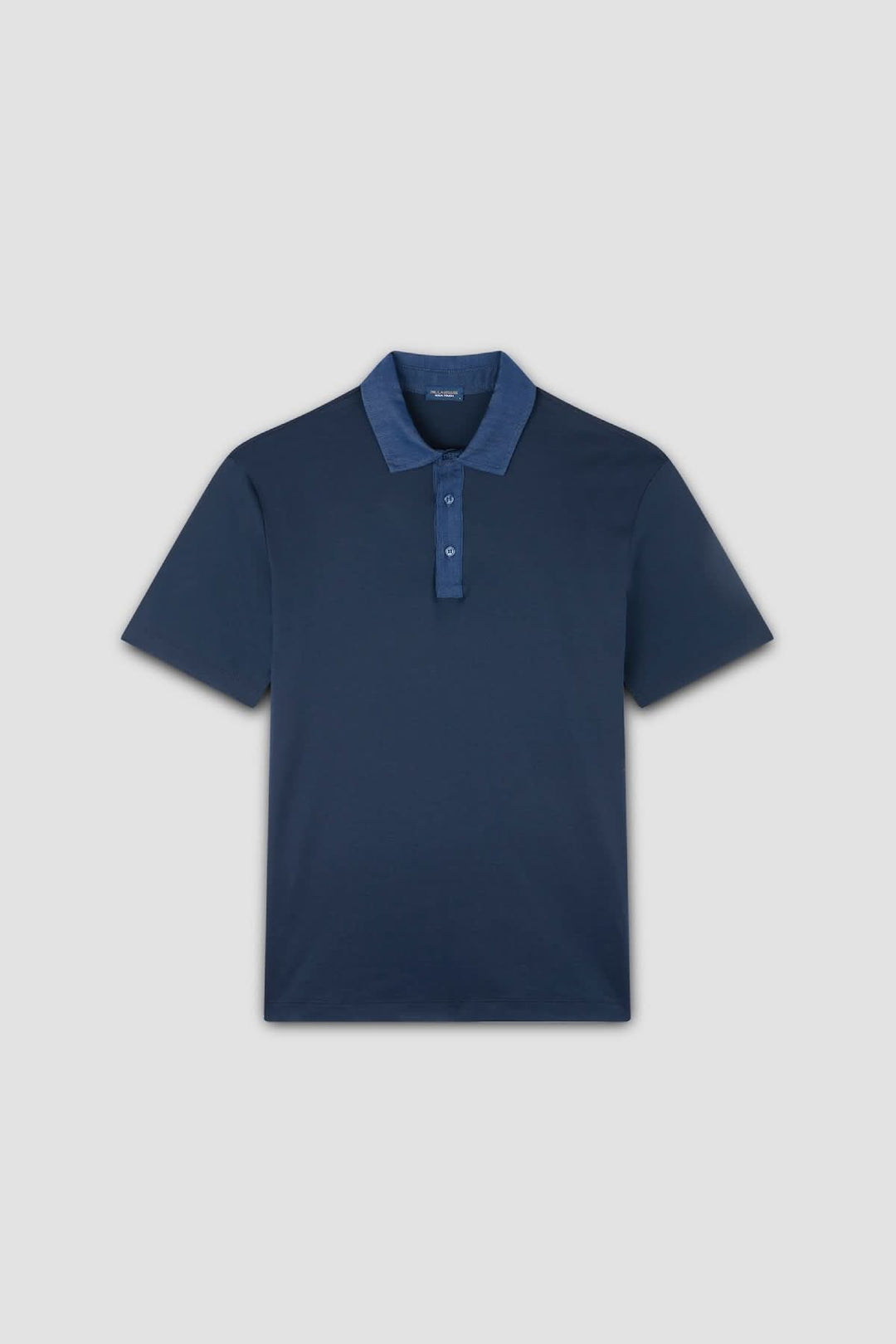 Polo marine en coton avec col contrastant en denim, style moderne et élégant, coupe régulière.