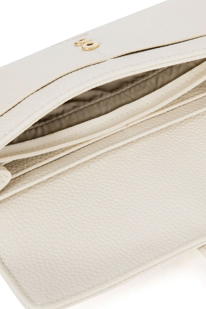 Intérieur du portefeuille Seun, avec plusieurs compartiments pour cartes et une poche zippée.