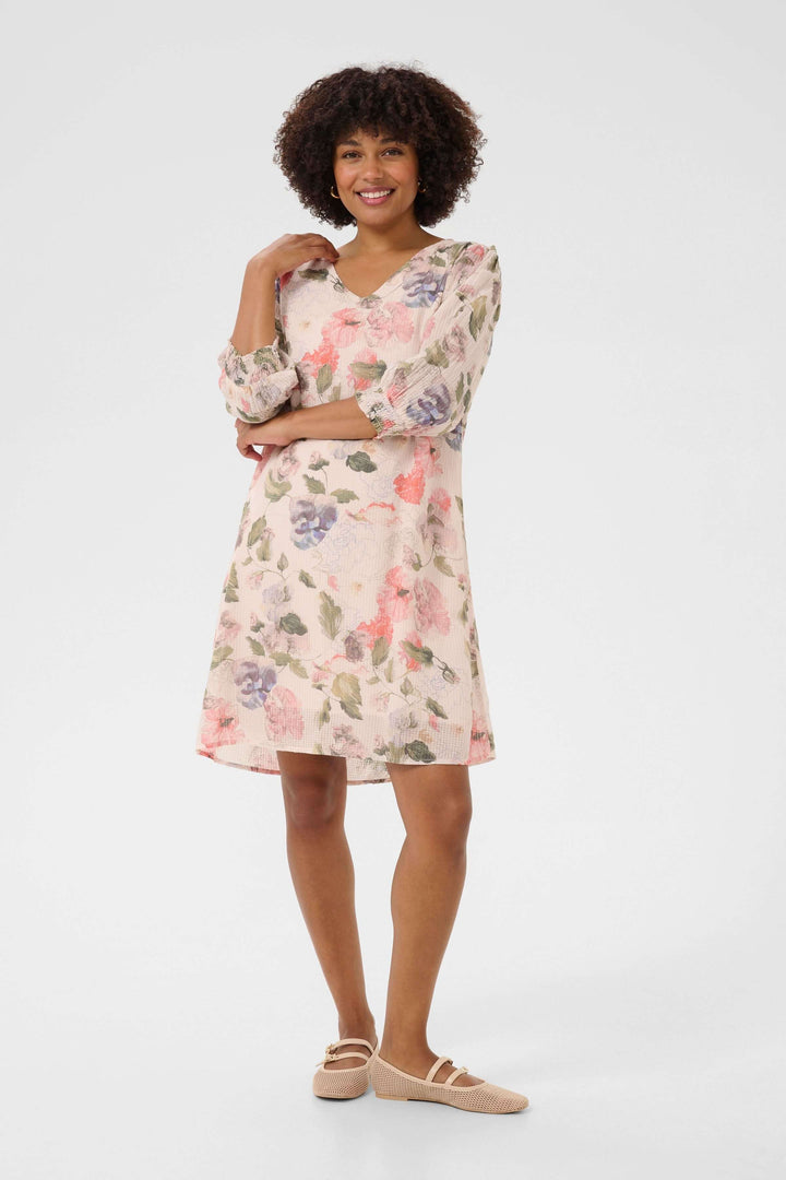 Robe Hailey à imprimé floral, col en V, manches longues smockées, style bohème et féminin.