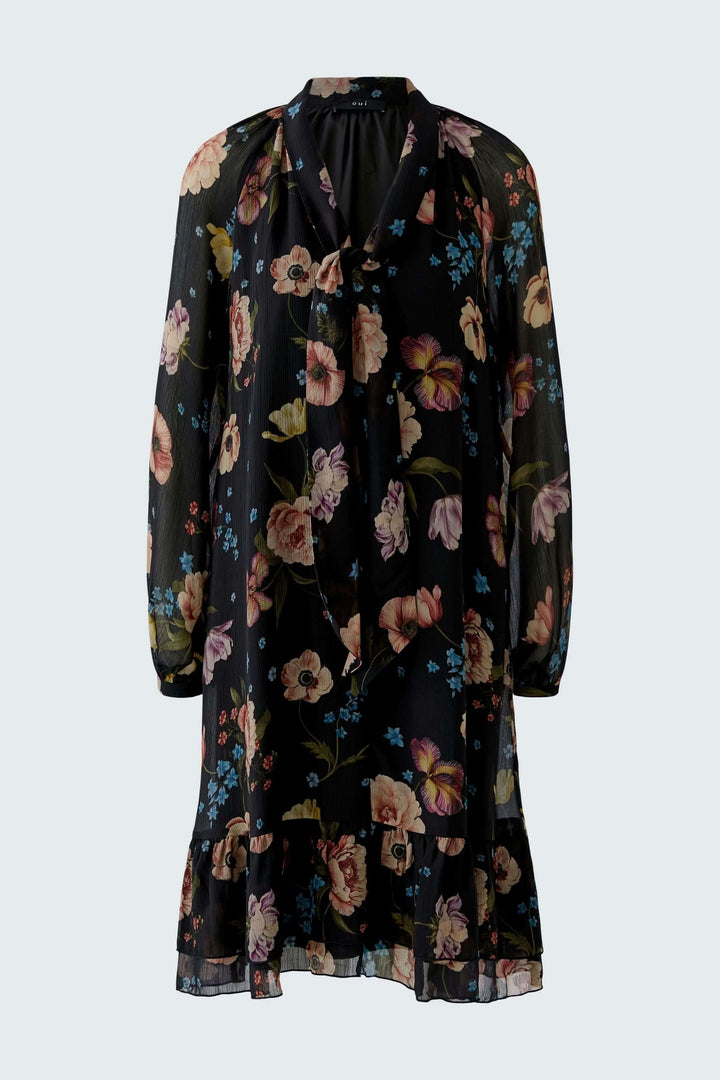 Robe midi fluide avec imprimé floral raffiné et encolure à nouer, coupe droite légèrement évasée pour un look féminin et élégant.