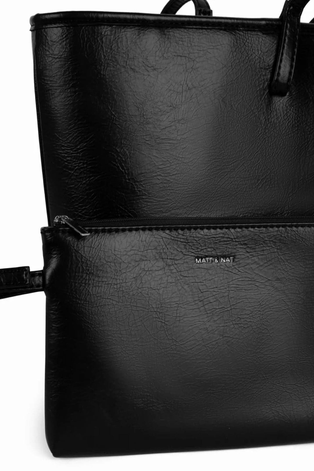 Sac fourre-tout Eliza en noir, avec poches zippées pour un rangement pratique et élégant.